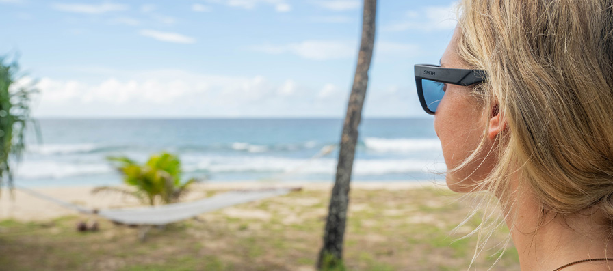 Woman wearing Smith Lowdown 2 sunglasses looking out to the ocean