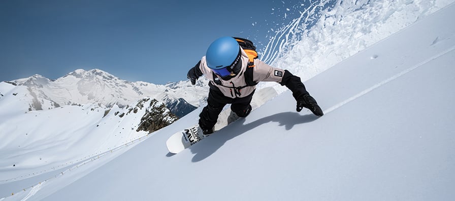 Snowboarder wearing Smith Method Pro helmet